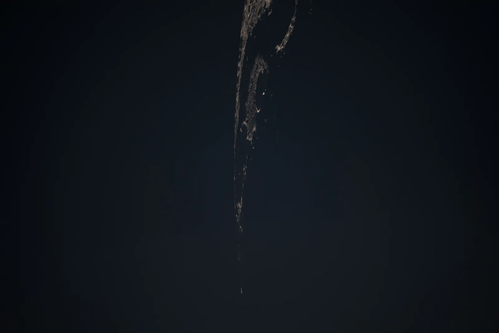 Artemis II photo ART002-E-14031: Earthset at 23:03 UTC: Earth sinking behind the Moon