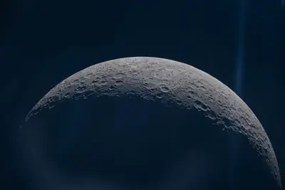 Artemis II photo ART002-E-12623: Earthset at 23:01 UTC: Earth sinking behind the Moon