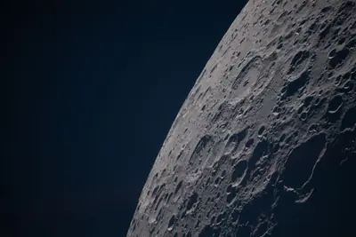 Artemis II photo ART002-E-12708: Earthset at 23:03 UTC: Earth sinking behind the Moon