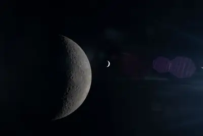 Artemis II photo ART002-E-15228: Earthset at 22:33 UTC: Earth sinking behind the Moon