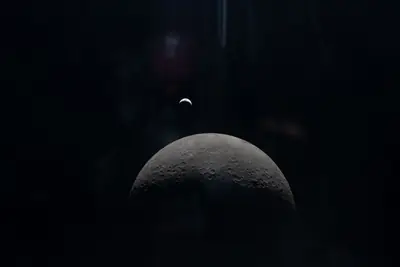 Artemis II photo ART002-E-15233: Earthset at 22:33 UTC: Earth sinking behind the Moon