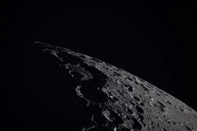 Artemis II photo ART002-E-19216: Earthset at 22:32 UTC: Earth sinking behind the Moon