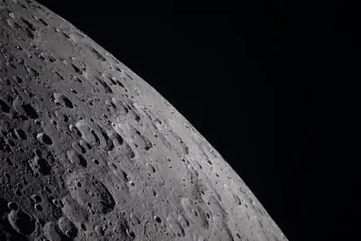 Artemis II photo ART002-E-20838: Earthset at 22:32 UTC: Earth sinking behind the Moon