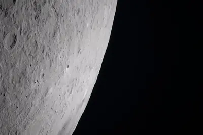 Artemis II photo ART002-E-20868: Earthset at 22:32 UTC: Earth sinking behind the Moon