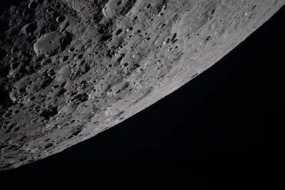 Artemis II photo ART002-E-20892: Earthset at 22:33 UTC: Earth sinking behind the Moon