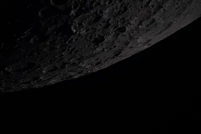 Artemis II photo ART002-E-20896: Earthset at 22:33 UTC: Earth sinking behind the Moon