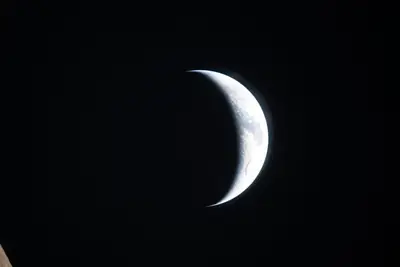 Artemis II photo ART002-E-20956: Earthset at 22:36 UTC: Earth sinking behind the Moon