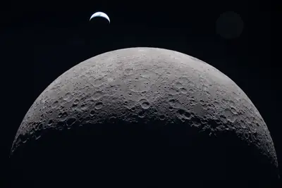 Artemis II photo ART002-E-20971: Earthset at 22:36 UTC: Earth sinking behind the Moon
