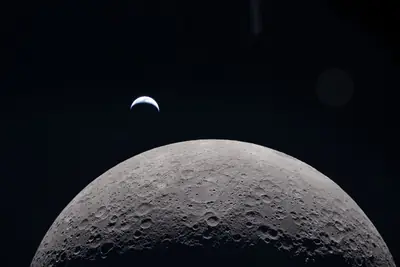 Artemis II photo ART002-E-21001: Earthset at 22:36 UTC: Earth sinking behind the Moon