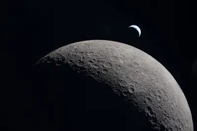 Artemis II photo ART002-E-21036: Earthset at 22:38 UTC: Earth sinking behind the Moon