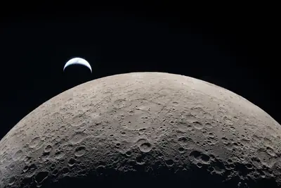Artemis II photo ART002-E-21096: Earthset at 22:39 UTC: Earth sinking behind the Moon
