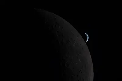 Artemis II photo ART002-E-21168: Earthset at 22:41 UTC: Earth sinking behind the Moon