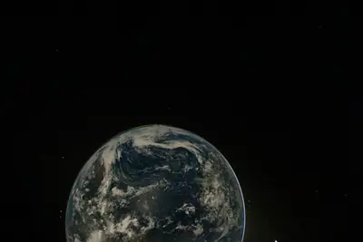 Artemis II photo ART002-E-25529: Earth falling away after the translunar burn, 19,522 km out