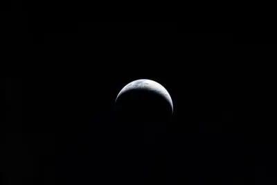 Artemis II photo ART002-E-4443: Earth from 228,033 km, on the way to the Moon